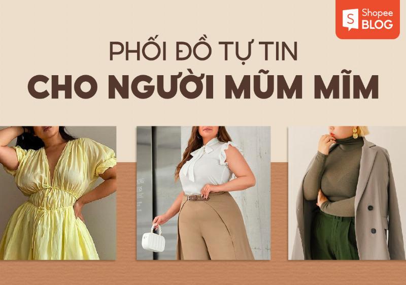 Người phụ nữ với làn da ngăm khỏe khoắn đang mỉm cười, mặc chiếc áo màu xanh coban nổi bật, tay chạm tóc thể hiện sự tự tin và phong cách.