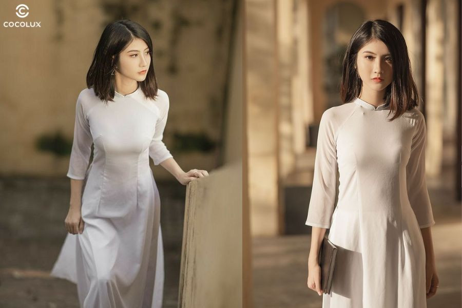 Cô gái mặc áo dài xanh với kiểu tóc ngắn ngang vai uốn cụp, tôn nét trẻ trung cho mặt tròn