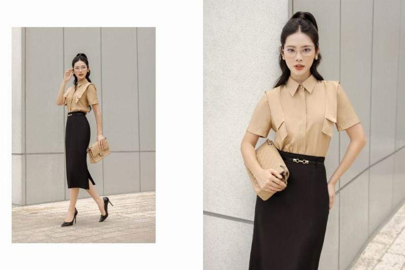 Cách phối đồ chân váy dài đen đi làm với áo blouse họa tiết và túi xách công sở