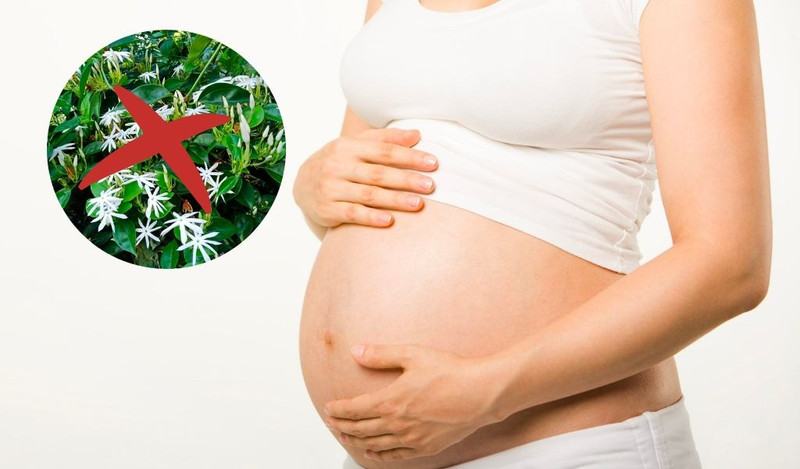 Người mẹ mang thai đang xoa bụng, minh họa đối tượng không nên dùng chè vằng