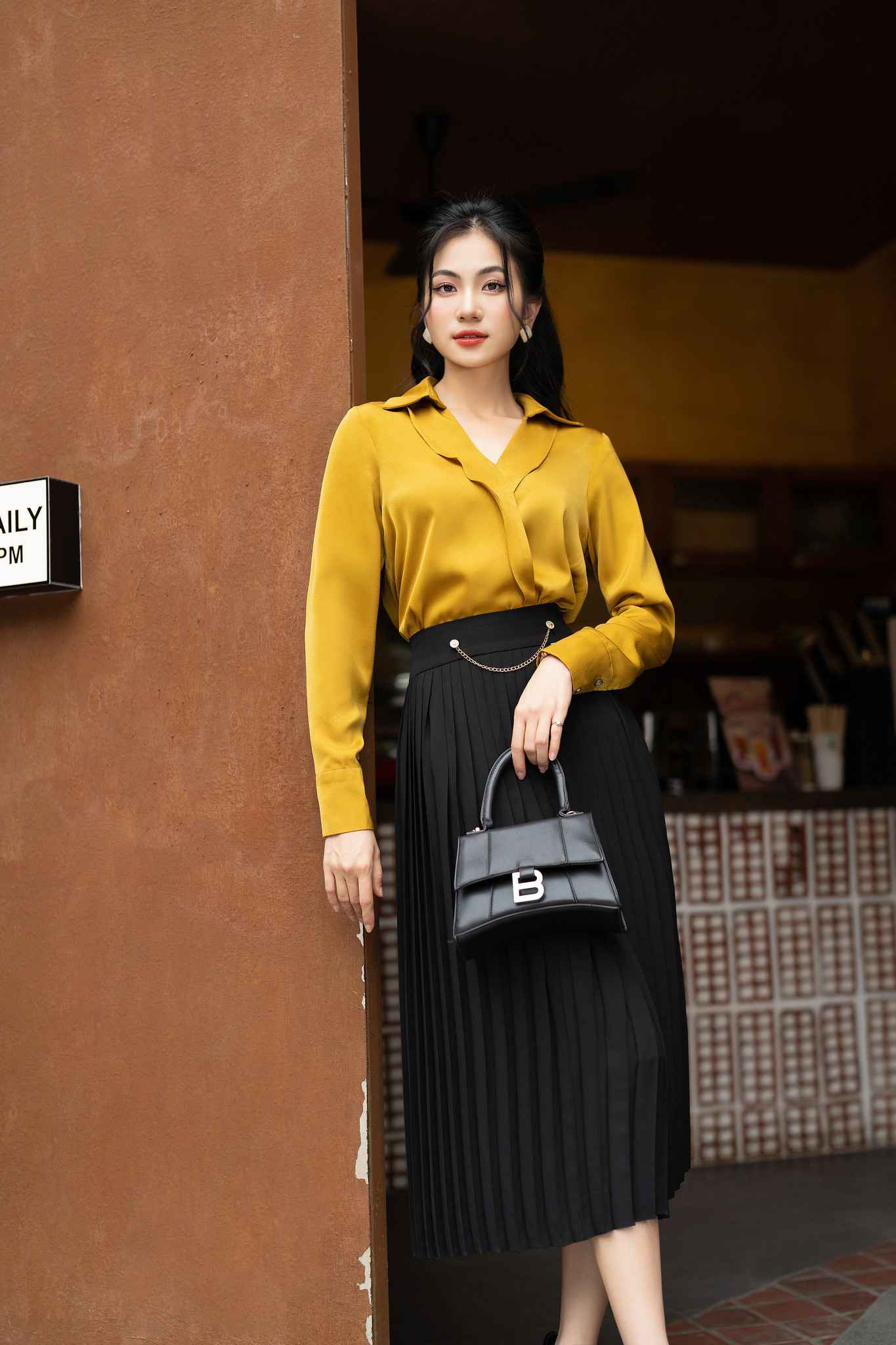 Áo sơ mi cách điệu cúc ẩn